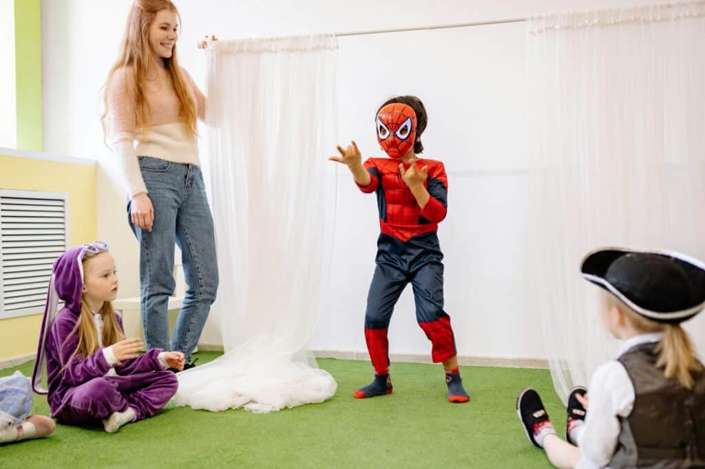 Young students in costume inside the classroom